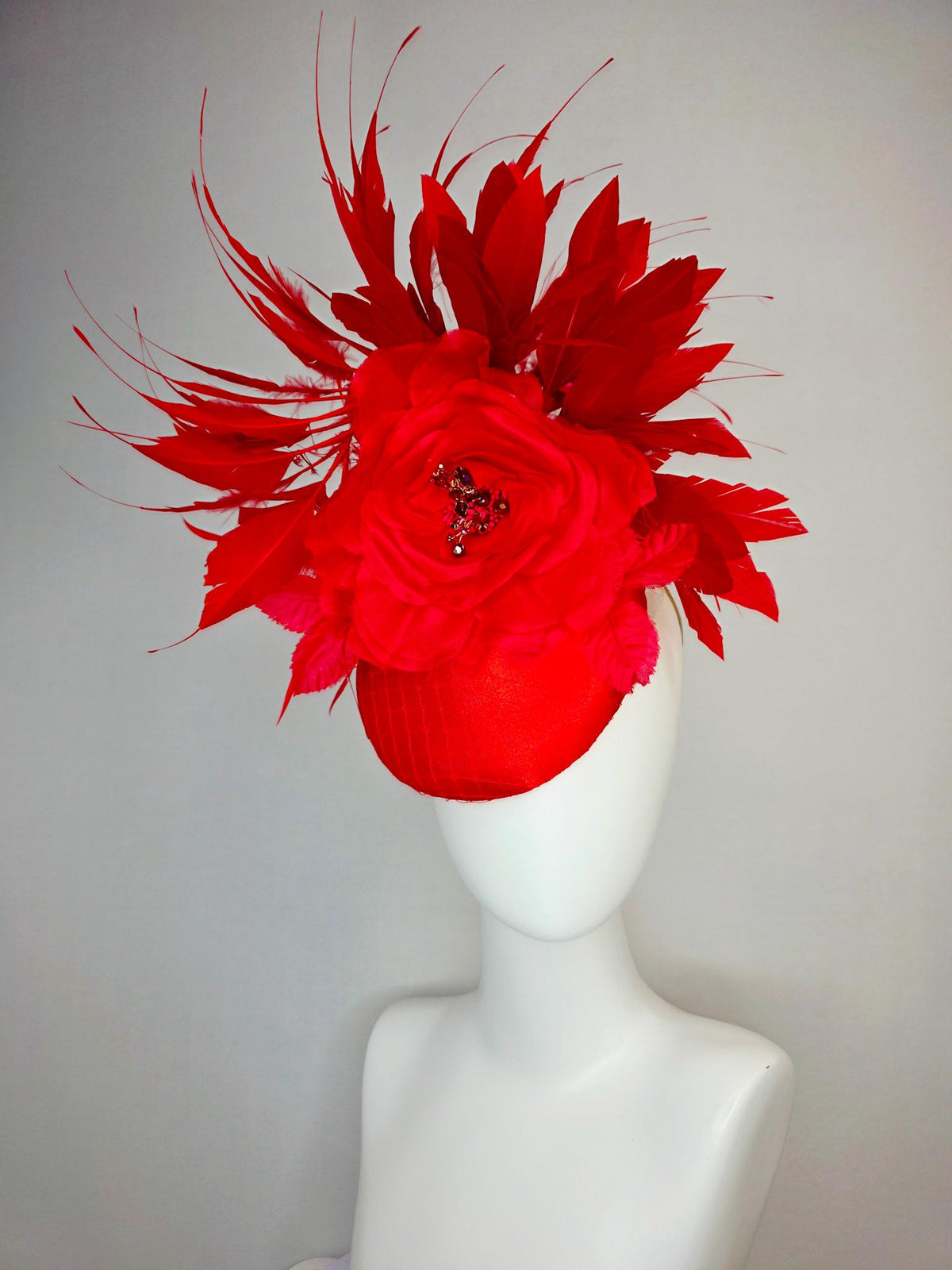 kentucky derby hat fascinator bright red satin with netting large red organza rose flower with red leaves and scarlet red branching feathers
