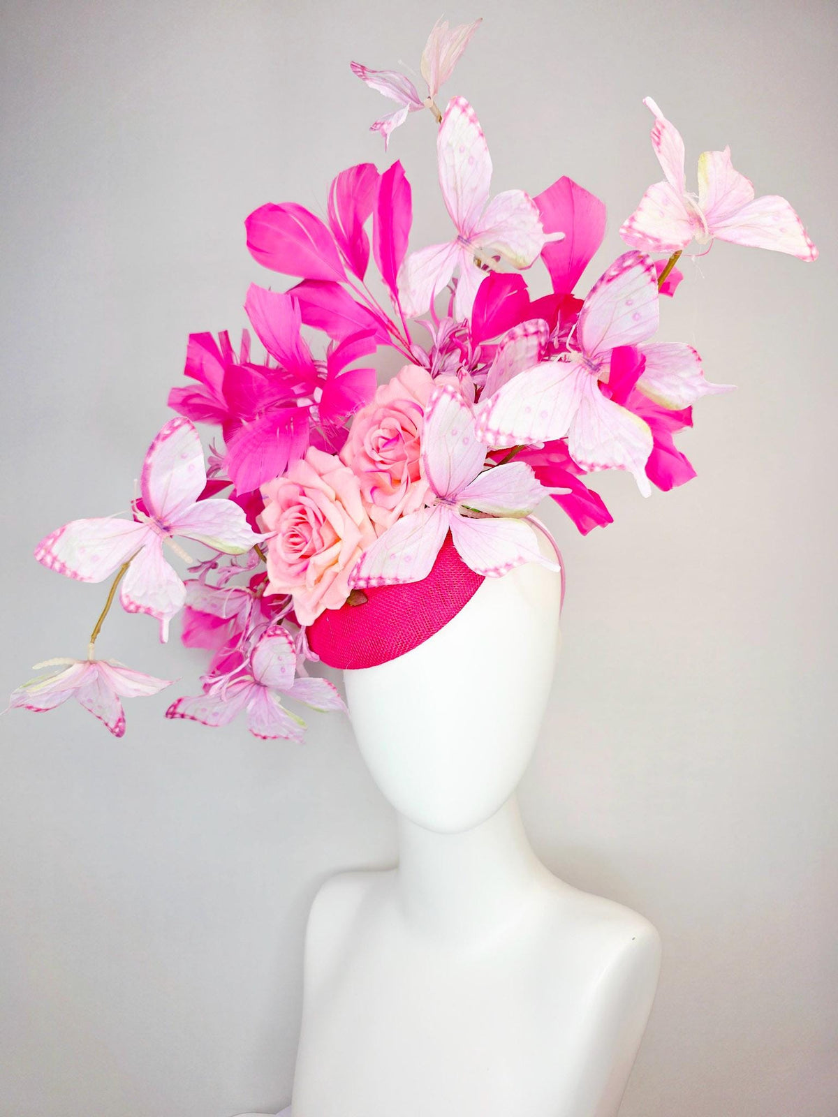 kentucky derby hat fascinator raspberry pink sinamay ombre pink satin roses lilac flowers hot pink branching feather light pink butterflies