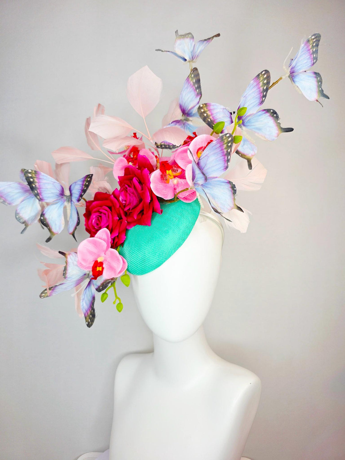 kentucky derby hat fascinator mint green sinamay red roses pink orchids pale light pink branching feathers black lavender purple butterflies