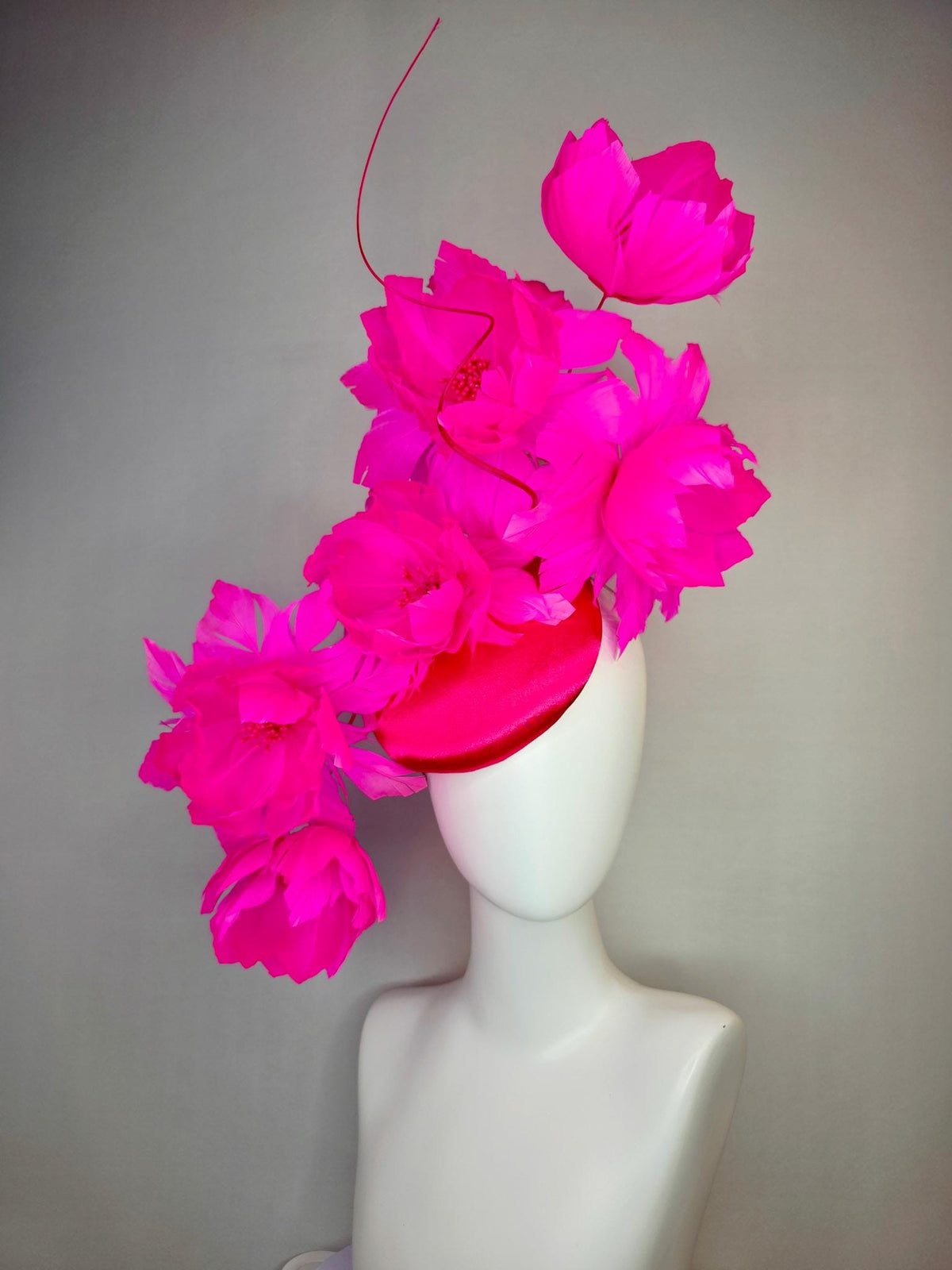 kentucky derby hat fascinator red satin with large fluffy bright fuchsia pink feather flowers and fuchsia pink feathers
