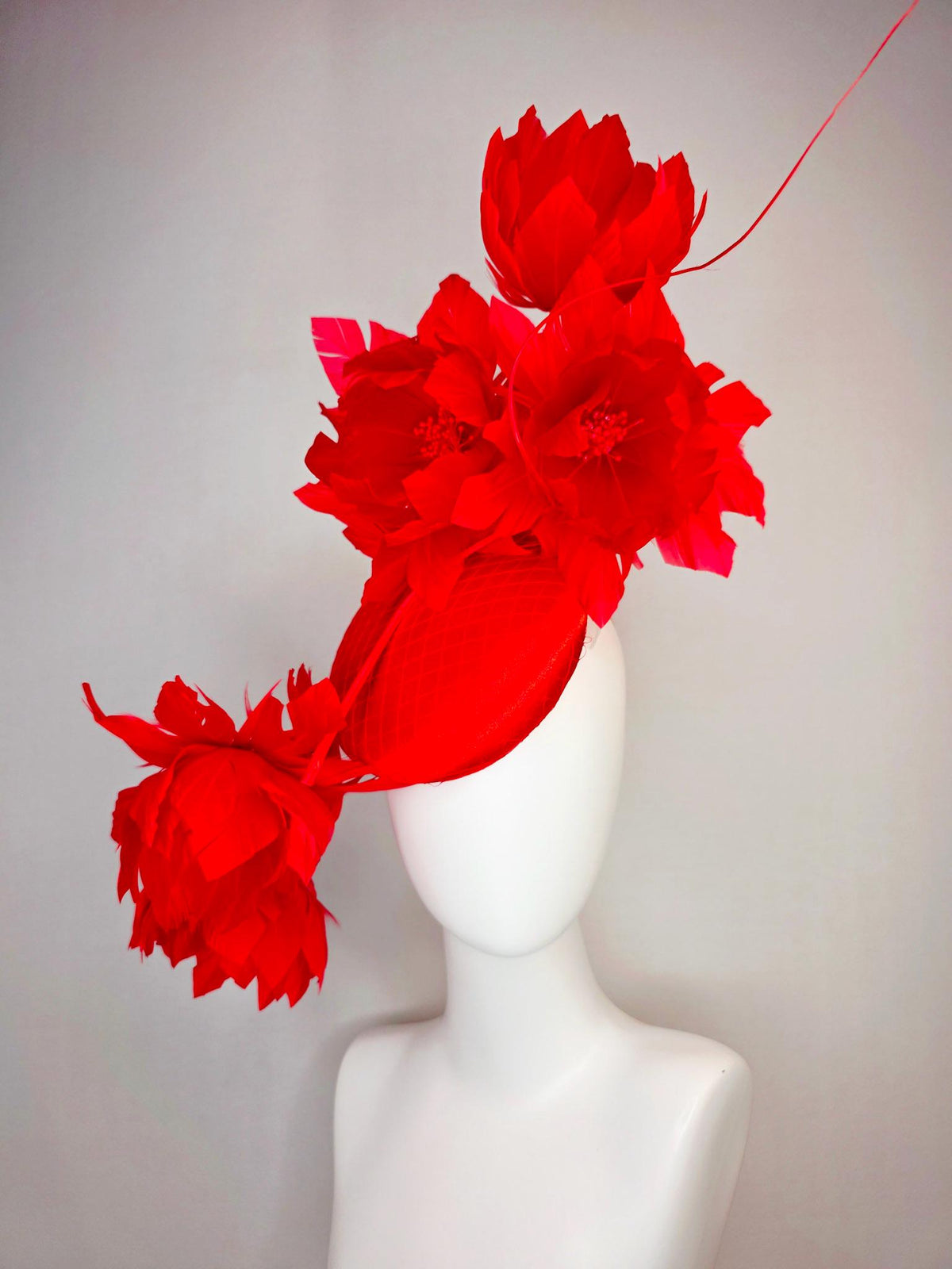 kentucky derby hat fascinator bright red satin with netting and large fluffy bright scarlet red feather flowers and red feathers