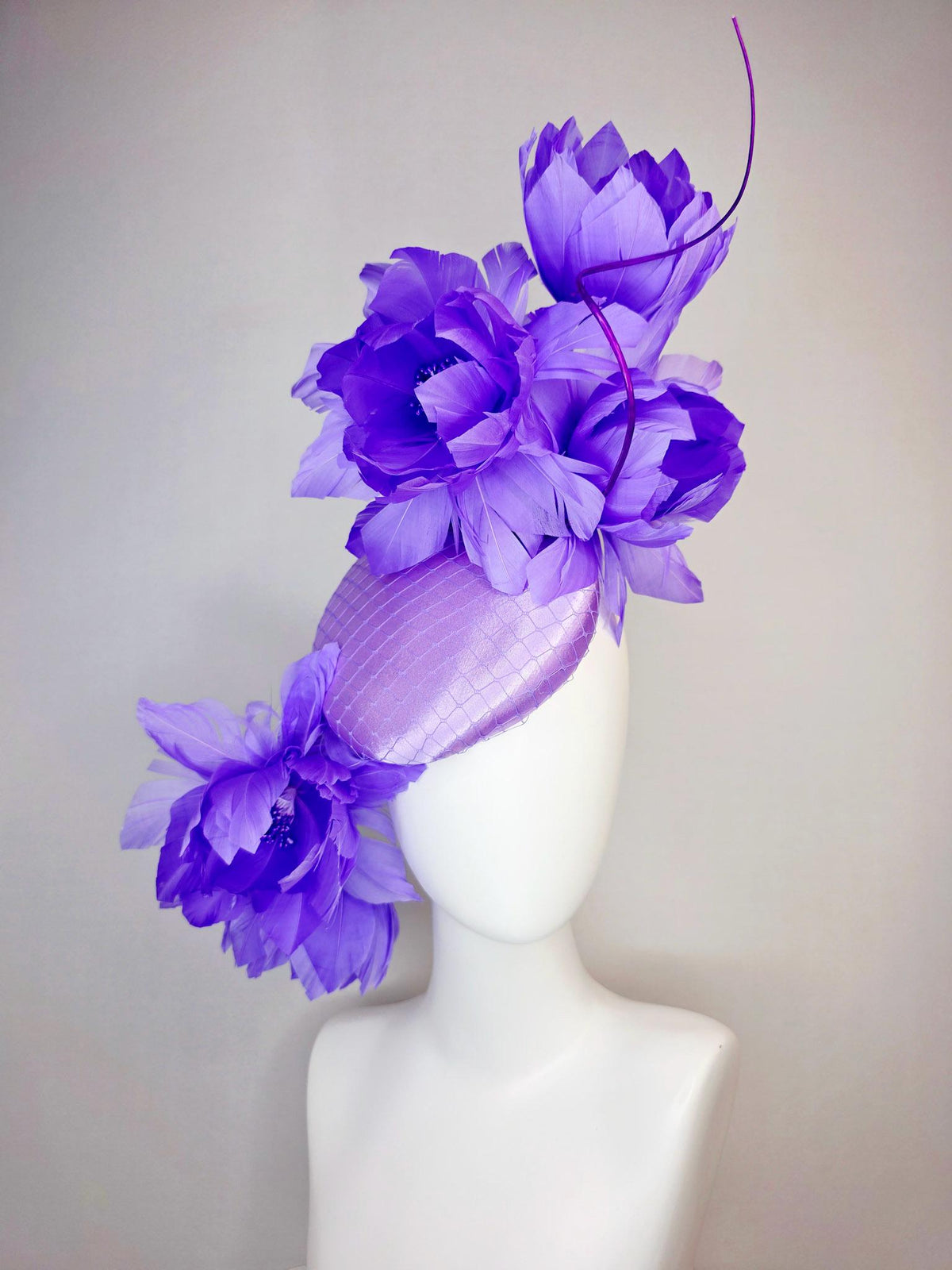 kentucky derby hat fascinator lavender purple satin with netting and large fluffy violet purple feather flowers and light purple feathers