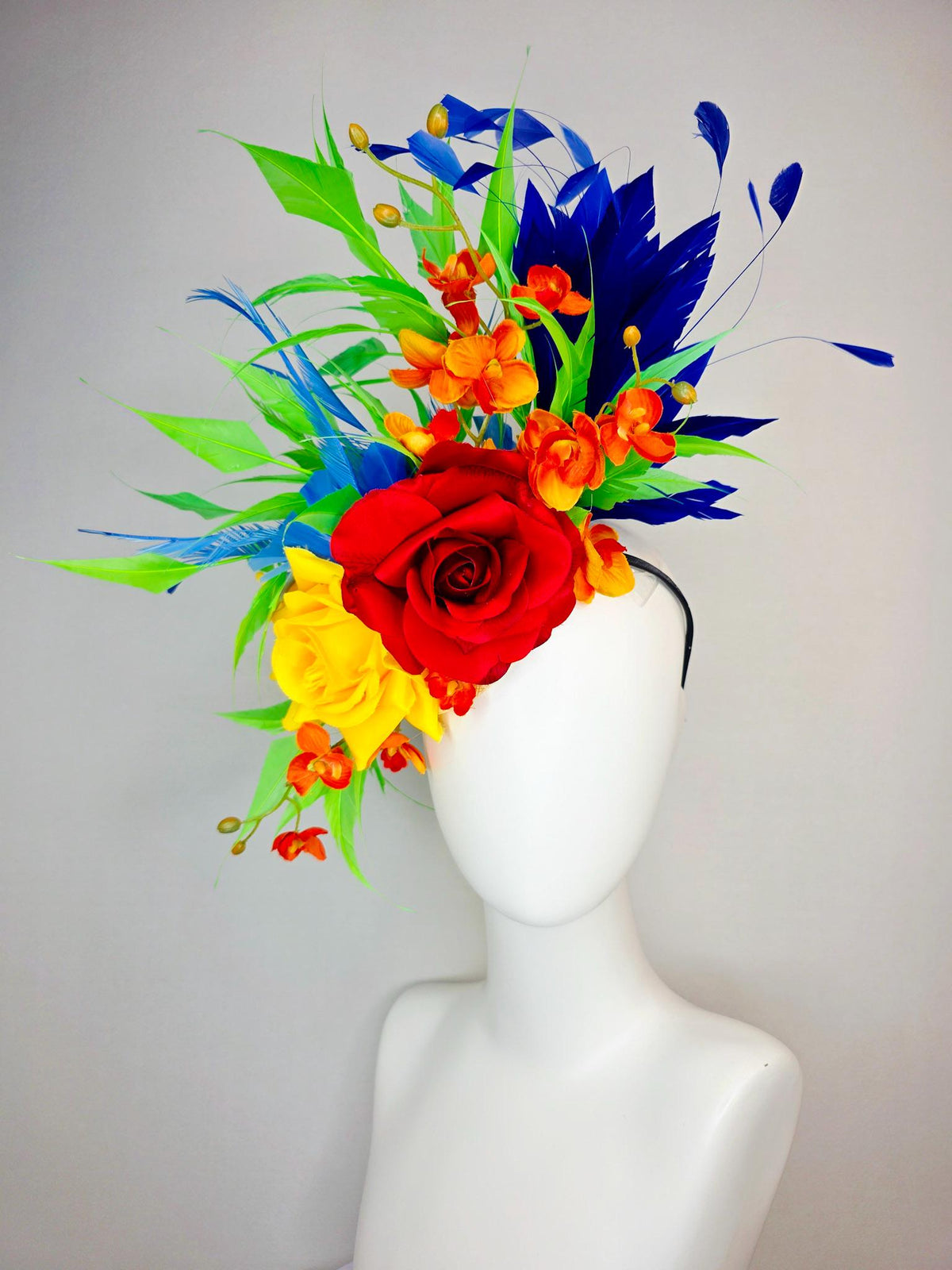 kentucky derby hat fascinator scarlet red and yellow satin roses orange red satin orchids cobalt royal blue lime green branching feathers