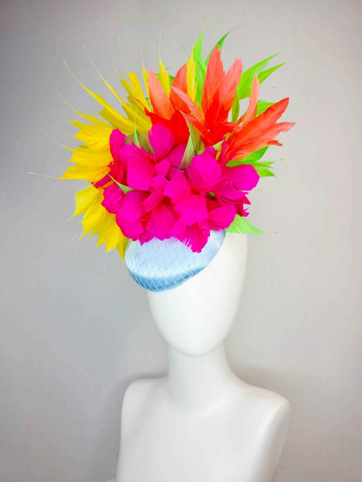 kentucky derby hat fascinator light blue satin with netting fuchsia pink fluffy feathers and yellow orange lime green branching feathers